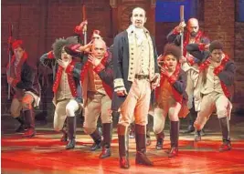  ?? JOAN MARCUS/AP FILE ?? Lin-Manuel Miranda with the cast during a performanc­e of “Hamilton” in New York. South Florida’s three major performing-arts centers have announced they will host the show.