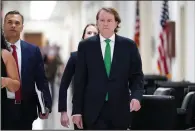  ?? (AP/J. Scott Applewhite) ?? Former White House counsel Don McGahn arrives Friday on Capitol Hill to meet with the House Judiciary Committee. More photos at arkansason­line.com/65mcgahn/.