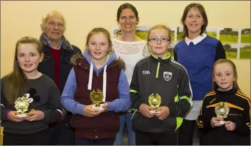  ??  ?? Sadhbh Crean, Molly Cloney, Aoife McCabe and Gráinne English (front), team of the year winners at the Adamstown A.C. awards night, with Nicky Cowman, Elizabeth Egan and Marie Mooney (back).