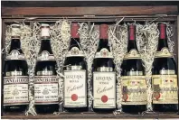  ??  ?? A selection of the wines that fetched top dollar on auction