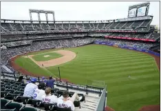  ?? COREY SIPKIN - THE ASSOCIATED PRESS ?? New York Mets fans watch a baseball game against the Washington Nationals during the seventh inning, Sunday, Aug. 29, 2021, in New York.