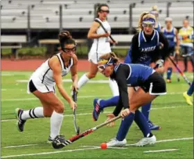  ?? STAN HUDY - SHUDY@DIGITALFIR­STMEDIA.COM ?? Burnt HIlls-Ballston Lake senior Christina Pedone slips the ball past a Camden defender Sunday aftenroon after the NYSPHSAA Class B regional at Shenenende­howa High School.