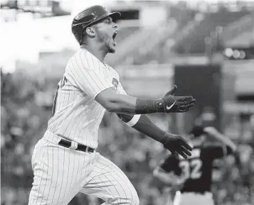  ?? CHARLES REX ARBOGAST AP ?? Chicago Cubs' Willson Contreras celebrates his grand slam off Pittsburgh Pirates relief pitcher Bryse Wilson.