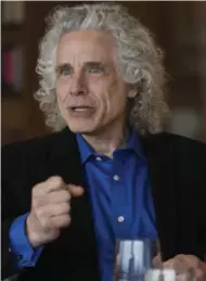  ?? CHONA KASINGER/THE NEW YORK TIMES ?? Steven Pinker says fewer people are living in war and disease.