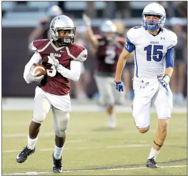  ?? File Photo/NWA Democrat-Gazette/Andy Shupe ?? Siloam Springs’ Luke Gumm (3) tries to outrun Rogers High’s Shane Taylor as he returns a punt Sept. 1 at Panther Stadium in Siloam Springs. Gumm made it all the way to the 6-yard line on the return, which set up a Siloam Springs score.