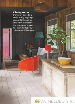  ??  ?? Living area
Dark grey panelling and a stripy rug help zone off this seating area from the rest of the open-plan space. For a similar rug, try John Lewis & Partners