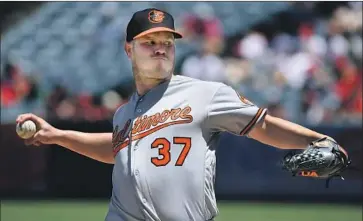  ?? John McCoy Getty Images ?? THE ANGELS BELIEVE that getting Dylan Bundy out of the AL East could be worth a run in his ERA.