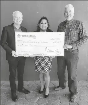  ?? LOANED PHOTO FROM AWC ?? PICTURED FROM LEFT are Foothills Bank President and CEO Brian Riley, AWC Foundation Coordinato­r of Developmen­t Gladys Anaya and retired Foothills Bank Senior Commercial Banker and Vice President Ray Face.