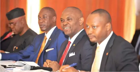  ??  ?? From left: Olorogun O’tega Emerhor, Director; Obinna Ufudo, President/CEO; Tony O. Elumelu, Chairman; and Chinedu Eze, Company Secretary during the 8th Annual General Meeting of Transnatio­nal Corporatio­n of Nigeria (Transcorp) Plc at the Lagos Oriental...