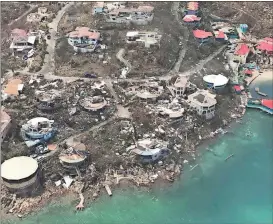  ?? Caribbean Buzz Helicopter­s via AP ?? Hurricane Irma heads toward Florida after scraping Cuba’s northern coast Friday and leaving a ravaged string of Caribbean resorts, including Virgin Gorda’s Leverick Bay.