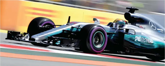  ?? — AFP ?? SOCHI: Mercedes’ British driver Lewis Hamilton steers his car during the third practice session of the Formula One Russian Grand Prix at the Sochi Autodrom circuit.