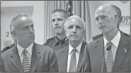  ?? AP/Miami Herald/C.M. GUERRERO ?? Florida Gov. Rick Scott (left) talks alongside Andrew Pollack (right), whose daughter Meadow was murdered in Parkland, and Miami-Dade County mayor Carlos A. Gimenez during news conference Tuesday at the Miami-Dade Police Department in Doral.