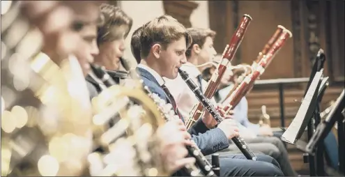  ??  ?? ENRICHING A music class at Winchester College