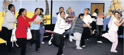  ??  ?? ●●Fitness instructor Cathrine Farrar working ladies into shape at the Hebron Church fitness classes for older women