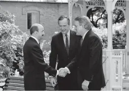  ?? Associated Press file photo ?? Mexican President Carlos Salinas de Gortari, left, greets President George H.W. Bush and Canadian Prime Minister Brian Mulroney in San Antonio in 1992.