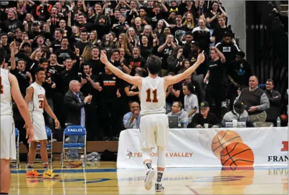  ?? SAM STEWART — DIGITAL FIRST MEDIA ?? Perkiomen Valley’s Justin Jaworski (11) celebrates after defeating Spring-Ford in the Pioneer Athletic Conference basketball championsh­ip Tuesday night at Norristown.