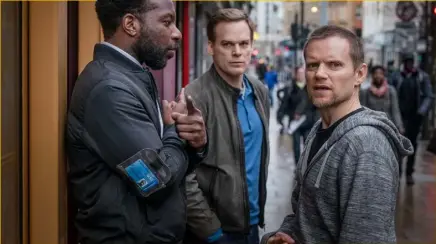  ??  ?? Michael C Hall, centre, and Marc Warren, right, in thrilling new Netflix series Safe