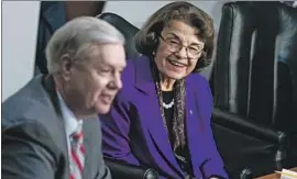  ?? Pool photo ?? SEN. DIANNE FEINSTEIN, senior Democrat on the Judiciary Committee, with GOP Sen. Lindsey Graham at the Supreme Court confirmati­on hearing.