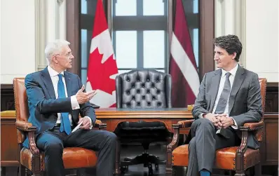  ?? SEAN KILPATRICK THE CANADIAN PRESS ?? Prime Minister Justin Trudeau takes part in a meeting with Latvian Prime Minister Krisjanis Karins on Parliament Hill in Ottawa on Thursday.