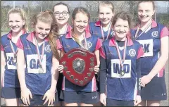  ??  ?? Market Bosworth’s Dixie Grammar School’s U13 (Year 8) girls’ netball team, front from left Danika Nuttall, Isla Crameri (captain), Tilly Lynn, and back from left, Alice Whitmore, Jennifer Smart, Megan Mears, Harriat Whitehead, won their category trophy at the Hinckley Ladies Junior Schools Invitation­al Tournament