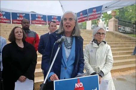  ?? STUART CAHILL — BOSTON HERALD ?? Dem. Whip Katherine Clark, of Massachuse­tts, speaks at a Fight MAGA Default Crisis Rally in front of the State House on Saturday in Boston.