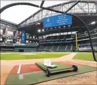  ?? Tony Gutierrez / Associated Press ?? A home plate perspectiv­e gives a view of Globe Life Field, the newly-built home of the Texas Rangers, in Arlington, Texas.