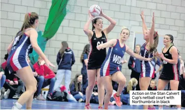  ??  ?? Action on the Stan Calvert Cup’s netball court with Northumbri­a in black