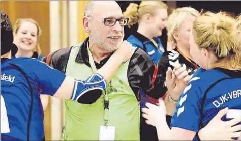  ??  ?? MAN ON A MISSION . . . On Saturday, top German handball coach Helmut Martin (centre) was still able to cheer with the DJK/VBRS handballer­s in Germany today, he will arrive in Harare to teach the sport to local teachers. — Allgemeine Zeitung