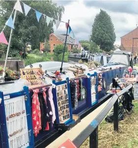  ?? ?? A trading boat full of wares.