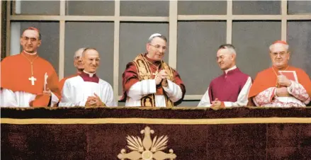  ?? AP ?? Pope John Paul I smiles as he appears on Aug. 26, 1978, at the central lodge of St. Peter’s Basilica at the Vatican soon after his election.