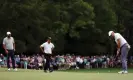  ?? Photograph: Maddie Meyer/Getty Images ?? Rory McIlroy putts on the 1st green for par – he would drop a shot on the par-5 2nd.