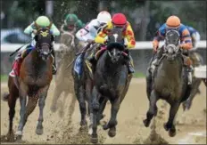  ?? PHOTO ARIANNA SPADONI/NYRA ?? Sue’s Fortune (center) with Junior Alvarado leads the way, capturing the G2 Adirondack by a half a-length Saturday at Saratoga Race Course.