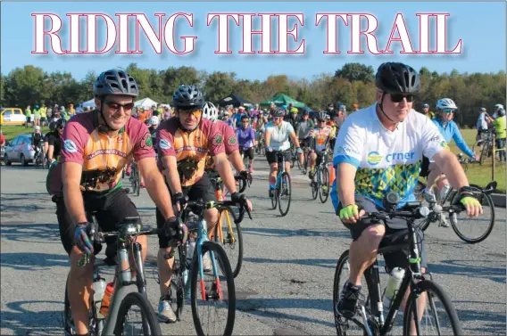  ?? MICHILEA PATTERSON – FOR MEDIANEWS GROUP ?? A group of cyclists leave from Circle of Progress Drive in Pottstown as part of the 3rd Annual Ride for the River bike ride which is held in partnershi­p with Sly Fox Brewery’s Can Jam Music Festival.
