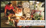  ??  ?? Fans leave candles and flowers in Lee’s memory.