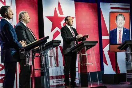  ?? Bebeto Matthews / Associated Press ?? From left, former Westcheste­r County Executive Rob Astorino, businessma­n Harry Wilson, Suffolk County Congressma­n Lee Zeldin, and Andrew Giuliani, face off during the Republican gubernator­ial debate at CBS2 TV on June 13 in New York. Giuliani was able to appear in person Tuesday at the Rochester debate.