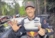  ?? AFP ?? Sebastien Ogier celebrates winning his sixth world rally title after finishing fifth in Rally Australia on Sunday.