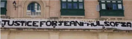  ?? ?? A banner calling for justice for Jean Paul Sofia, who was killed when a building under constructi­on collapsed in Kordin last December, was put up opposite the Parliament building on Monday