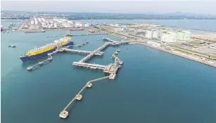  ??  ?? PTT’s LNG receiving terminal in Rayong. LNG infrastruc­ture is among the large energy projects planned for 2020.