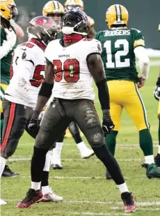  ?? MORRY GASH/AP ?? Bucs linebacker Jason Pierre-Paul is pleased with himself after sacking Packers quarterbac­k Aaron Rodgers in the NFC title game.