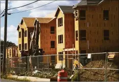  ?? Brian A. Pounds / Hearst Connecticu­t Media file photo ?? Constructi­on on the new Windward Commons mixed income housing developmen­t on the site of the old Marina Village Public Housing complex in Bridgeport in 2020.