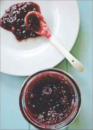  ?? CANADIAN PRESS PHOTO ?? People who love the combinatio­n of raspberry and chocolate will love this raspberry cocoa jam. It’s delicious on toast, brownie bites, ice cream, cheesecake, tarts and thumbprint cookies, says Amy Bronee, author of ‘The Canning Kitchen: 101 Simple...