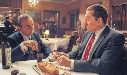  ?? NETFLIX THE ASSOCIATED PRESS ?? Joe Pesci and Robert De Niro in a scene from “The Irishman.” The film’s decade-spanning story required the developmen­t of a new camera rig to film actors on a real set under whatever lighting conditions were needed, without motion-capture or a green screen.