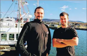  ?? SUBMITTED PHOTO/SCOTT AUCOIN ?? Stéphane Sogne, left, and Scott Aucoin of Cheticamp are working together along with Joel Lefort on a carbonneut­ral boat engine and were among the winners in the recent Spark Cape Breton competitio­n.