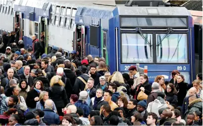  ?? AFP ?? A platform of the Gare de Lyon railway station in Paris is crowded on the first day of a two-day strike in France. —