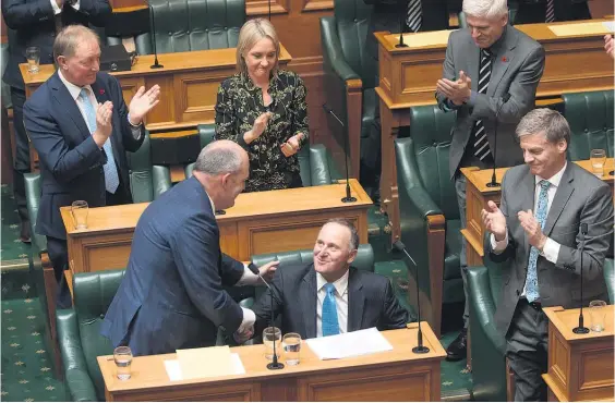  ?? Picture / Mark Mitchell ?? John Key’s colleagues gave him a standing ovation after his valedictor­y speech in Parliament yesterday.