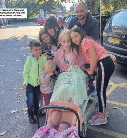  ??  ?? Samantha King and her husband Craig with their seven children
>