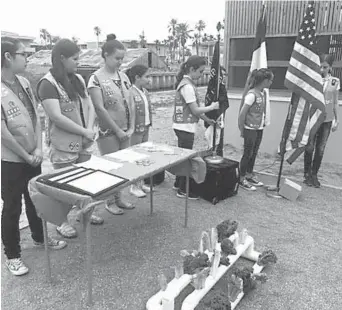  ?? David Sikes/Corpus Christi Caller-Times via AP ?? ■ In this undated photo, members of Girl Scouts organized and staged a dedication ceremony at the Amos Rehabilita­tion Keep as part of their Silver Award project in Port Aransas, Texas. The ARK, originally establishe­d as the Animal Rehabilita­tion Keep...