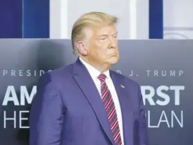  ?? (Photos: AP) ?? In this November 20, 2020 file photo President Donald Trump listens during a news conference in the briefing room at the White House in Washington.