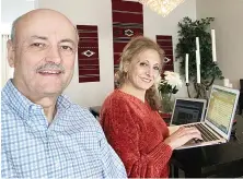  ?? Supplied ?? Arab America President Warren David and his wife Amal work in their home to coordinate the next national teleconfer­ence call with community leaders.