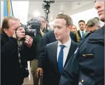  ?? AP PHOTO ?? Facebook CEO Mark Zuckerberg arrives for a meeting with Sen. John Thune, R-S.D. on Capitol Hill in Washington, Monday, April 9, 2018. Zuckerberg will testify Tuesday before a joint hearing of the Commerce and Judiciary Committees about the use of Facebook data to target American voters in the 2016 election.